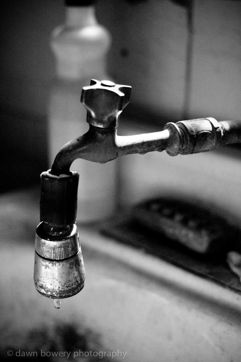 Old dripping tap still life photograph